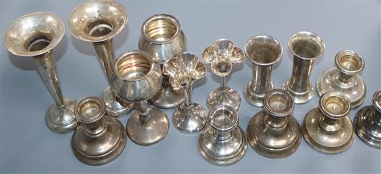 Four assorted pairs of silver posy vases including early 20th century and three pairs of silver dwarf candlesticks.